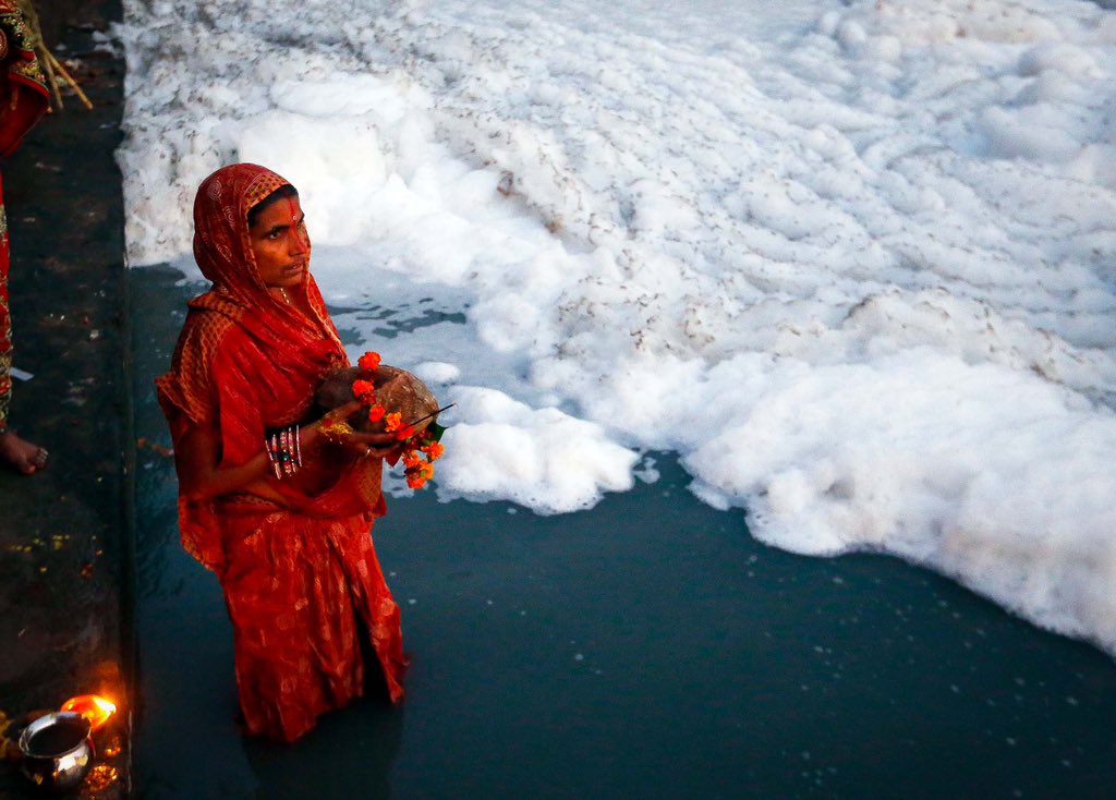 chhath puja amid the toxic foam in the yamuna
